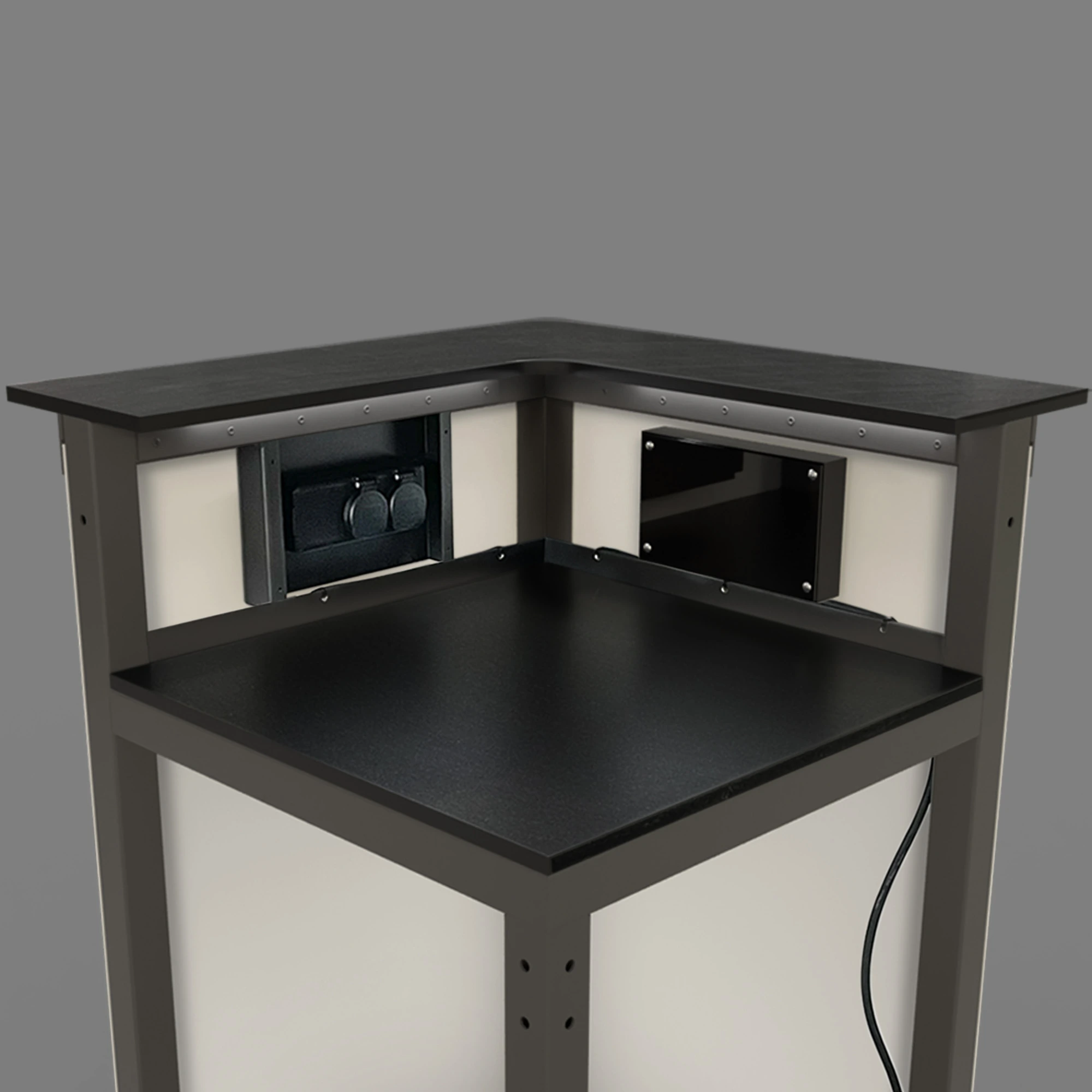 Example Image of a klappECKE 90° with a work light and dual power sockets mounted to it.